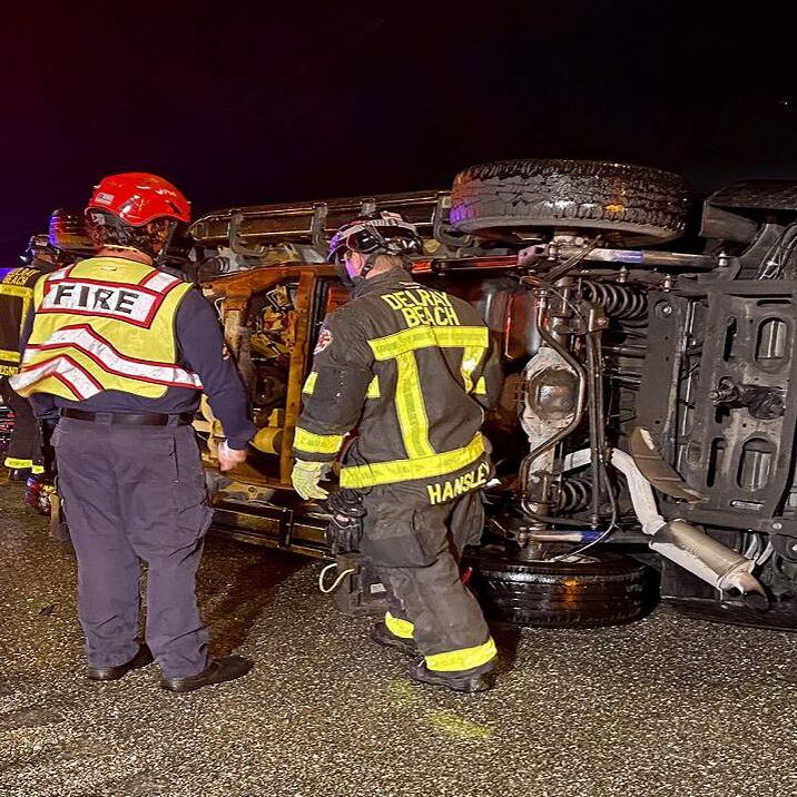 Adult, child extricated from SUV