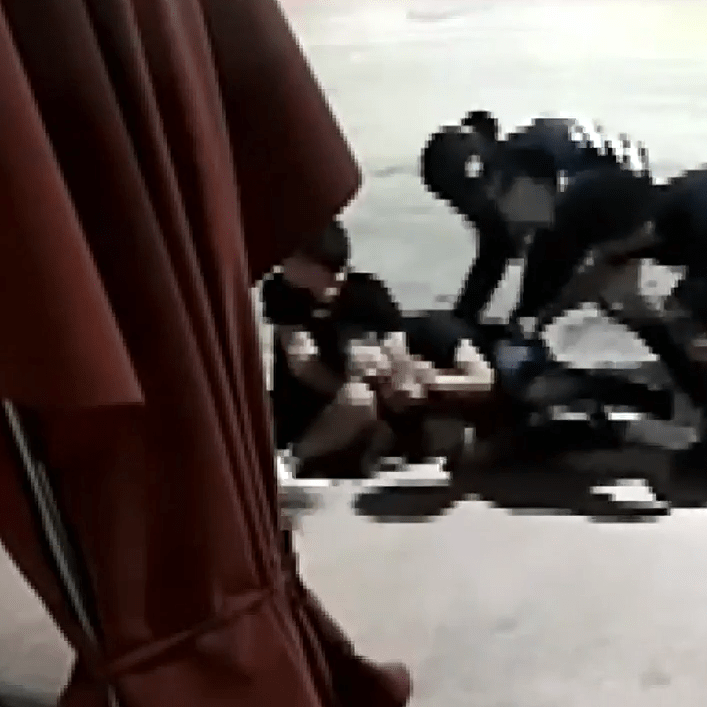 4 men assaulting, robbing tourist near Miami Beach police headquarters