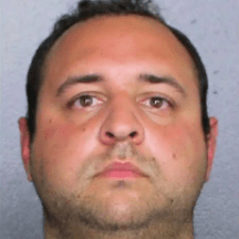A Fort Lauderdale police officer, who has also been identified as an assistant wrestling coach at Cardinal Gibbons High School, is expected to be released from jail Friday after he was arrested on accusations that he engaged in sexual chats online with an undercover detective who he believed was a young girl.