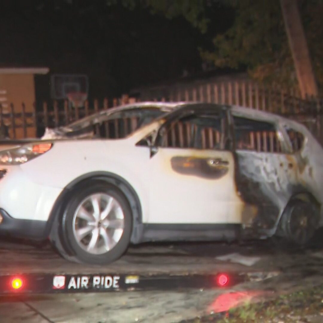 Two vehicles were scorched overnight in a fire in northwest Miami-Dade.