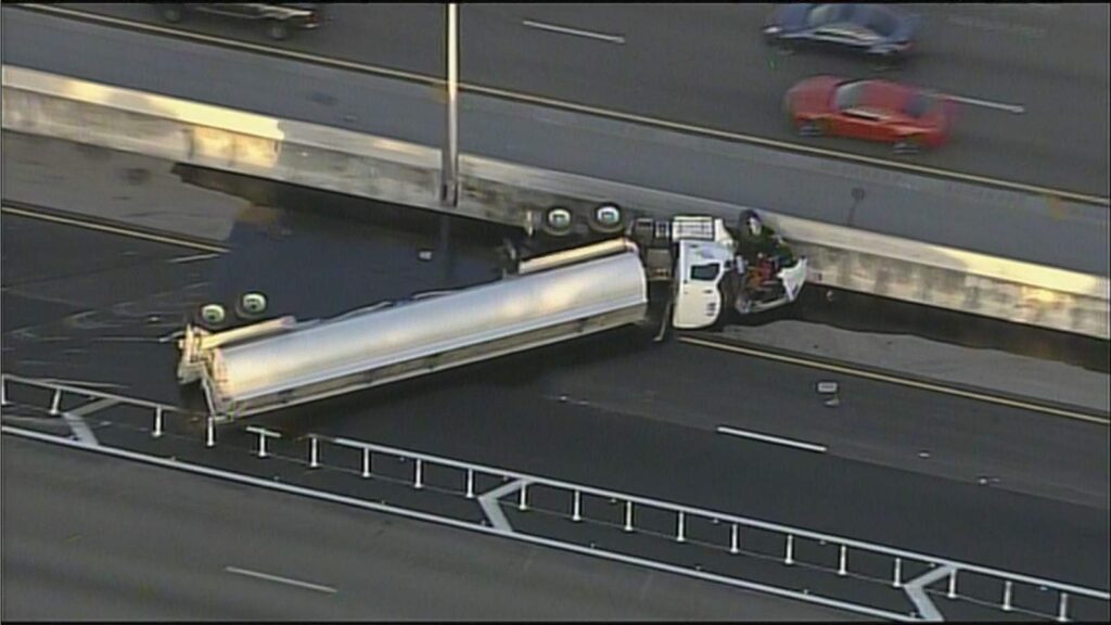 Tanker truck rolls over, spills 9,000 gallons of fuel on I-95