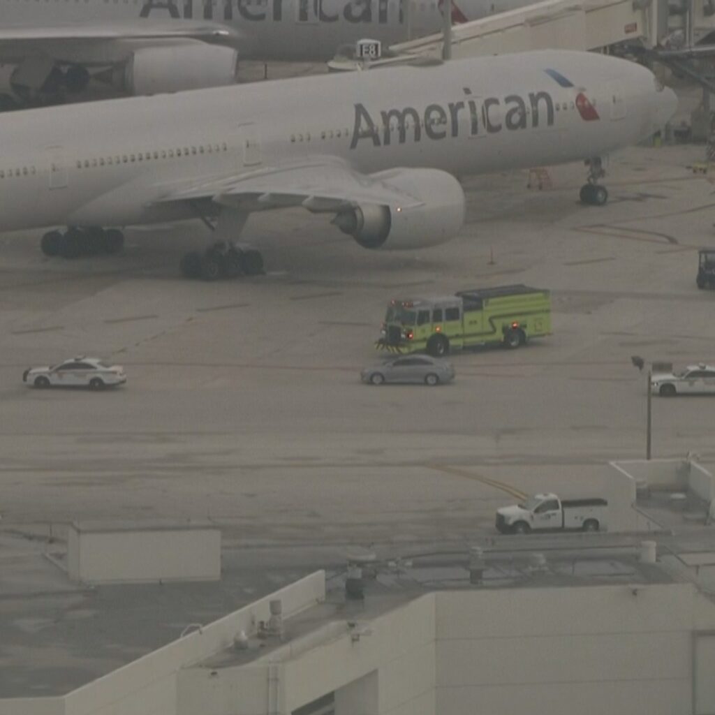 Man wearing hospital gown jumps fence at Miami International Airport