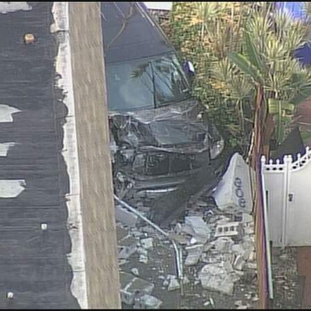 Pickup truck collides with scooter before hitting side of building in Miami